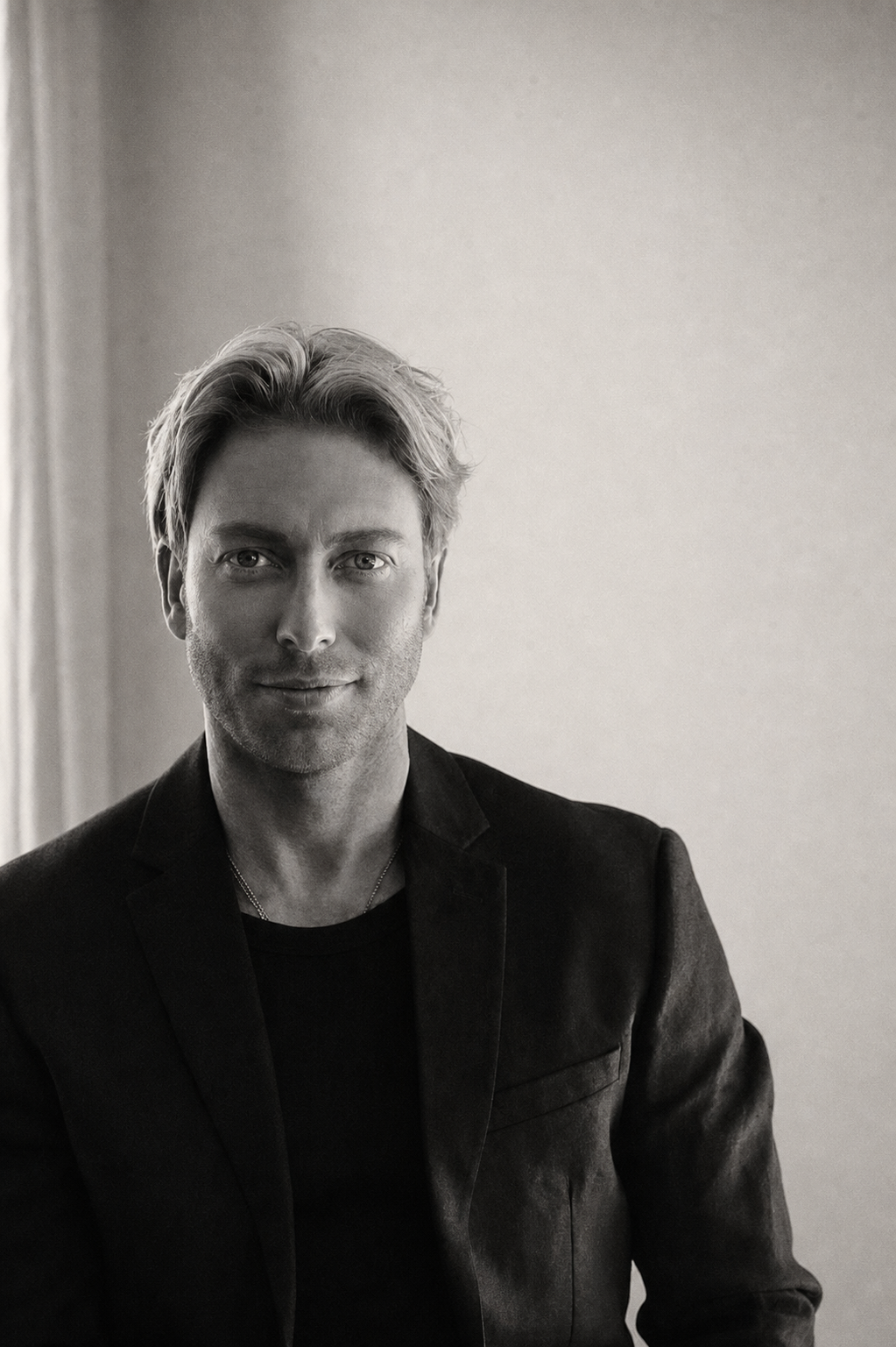 Black-and-white editorial portrait of Matthew Hoult